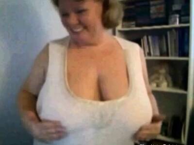 Mature Nancy playing with her boobs on webcam on girlfriendsporn.net