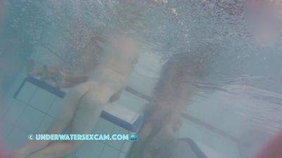 This Young Couple Plays Together Underwater In Front Of Many People on girlfriendsporn.net